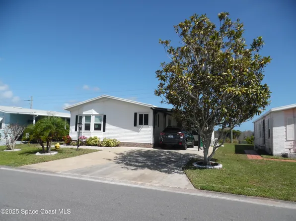 748 Gladiolus Dr, Barefoot Bay, FL 32976