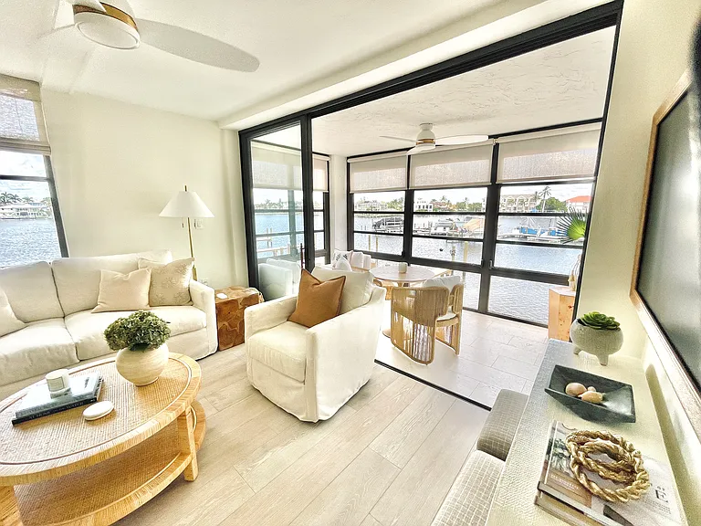 Bright and airy space with light filtering shades and woven blinds throughout