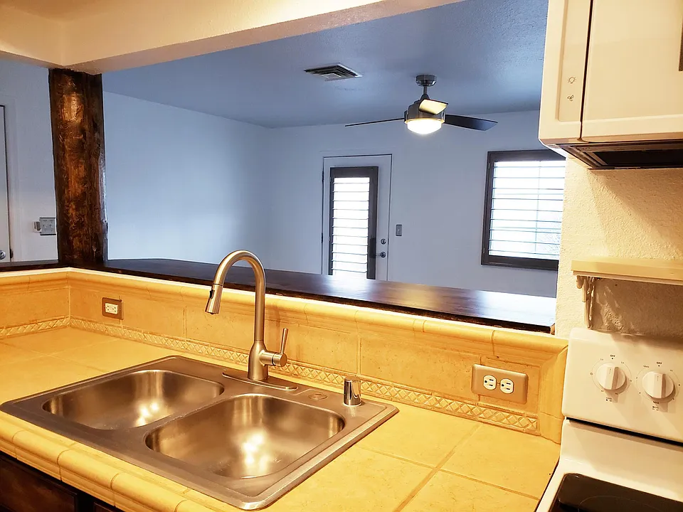 Hi-rise kitchen faucet makes for easy clean-up.