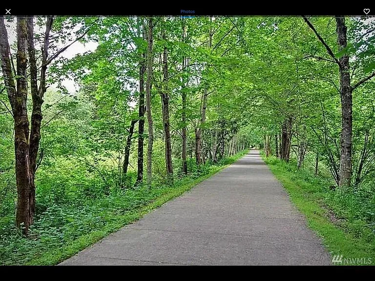 Pedestrian trail connecting downtown Issaquah to Tiger Mountain hiking trails runs behind Arrington Place.