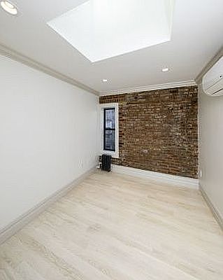 3rd image of 161 W 4th St APT 4F
