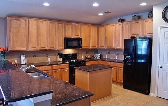 Granite kitchen counters! Open concept with plenty of cabinet space to meet all your needs!