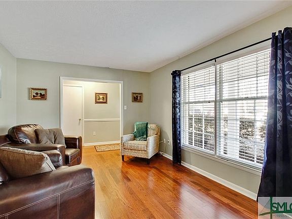 Spacious living/dining room with beautiful floors