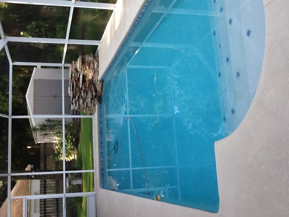 Enclosed salt water pool with water fountain