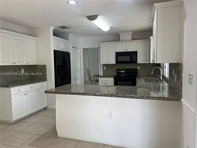 14131 SW 146th Ter #14131 — Photo 2