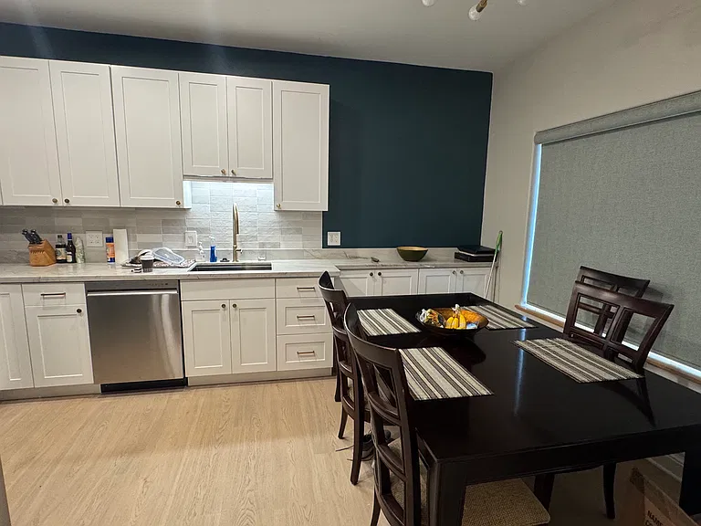 Open concept. Gorgeous new kitchen, overlooking the living room and dinning room area. Condo is 800 SQ