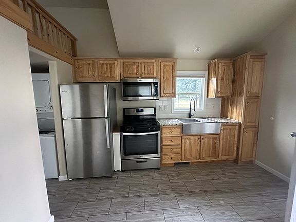 Kitchen with full size appliances.