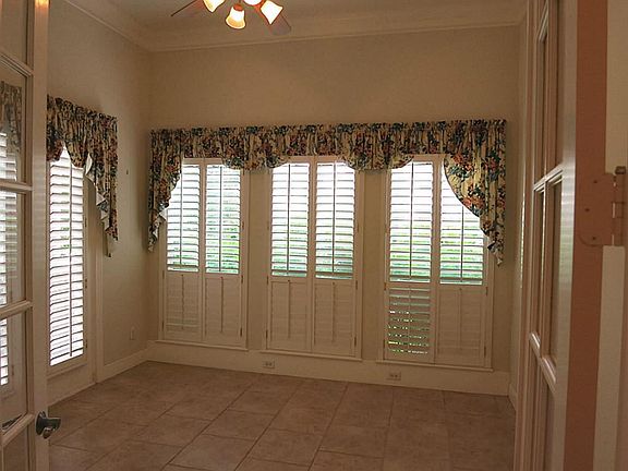 Study or formal living room off front entry - plantation shutters and french doors