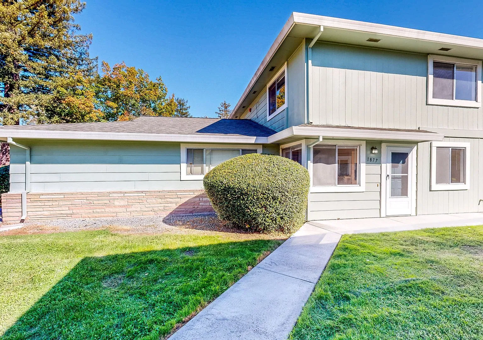 Lovely Two Bedroom One Bath Two Story Condo with Carport & Laundry Facility — Photo 1