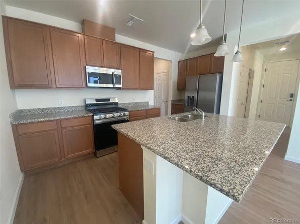 6153 N Ceylon Street Bldg 8 #201, Denver, CO 80249