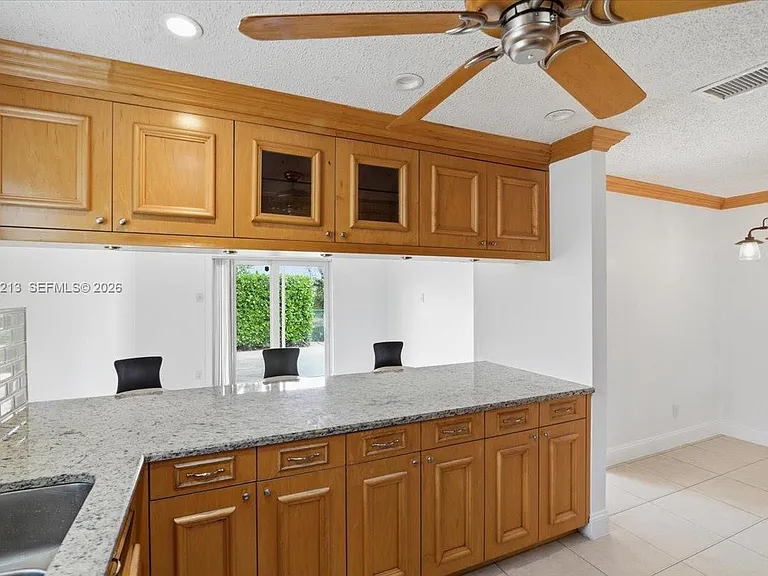 9349 NW 47th St — Photo 21
