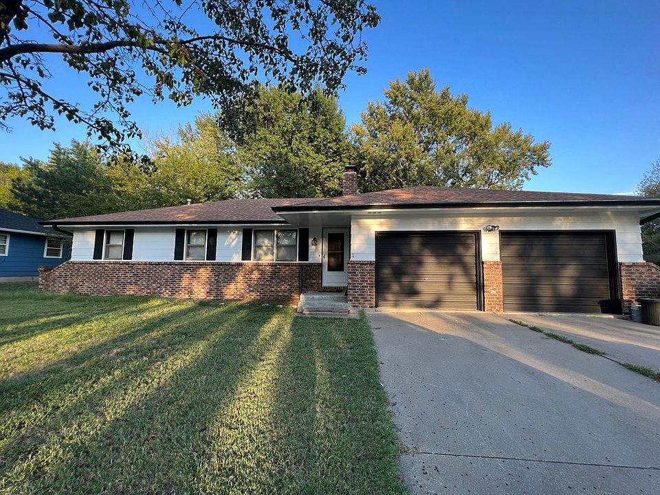 Front view of property with 2 car garage.