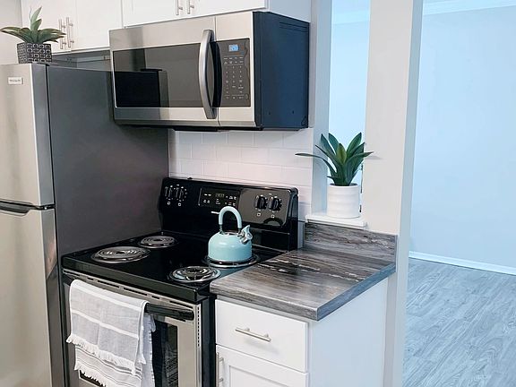 Our chic studio apartments feature a separate kitchen area with modern finishes, combining functionality with style.