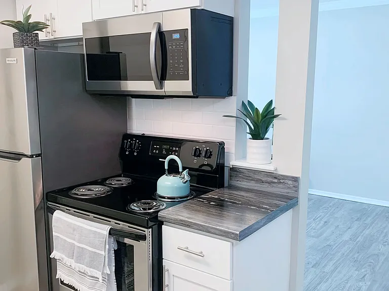 Our chic studio apartments feature a separate kitchen area with modern finishes, combining functionality with style.