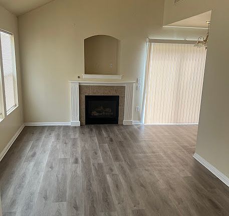 LIVING ROOM AND SLIDING GLASS DOOR