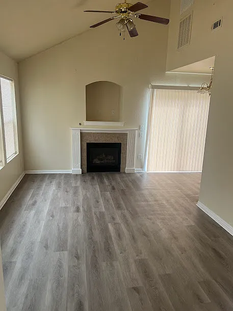 LIVING ROOM AND SLIDING GLASS DOOR