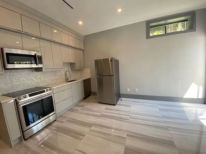 1388 W 57th Ave #1A — Photo 3