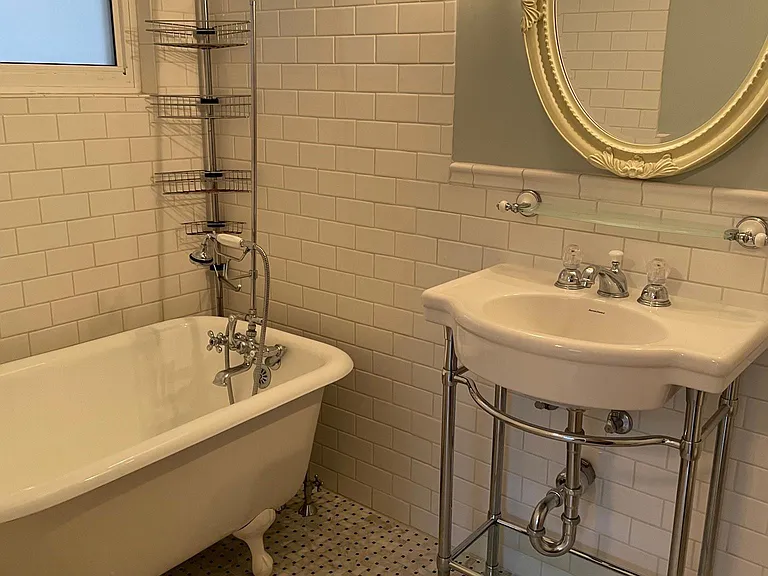 Master bath with clawfoot tub.