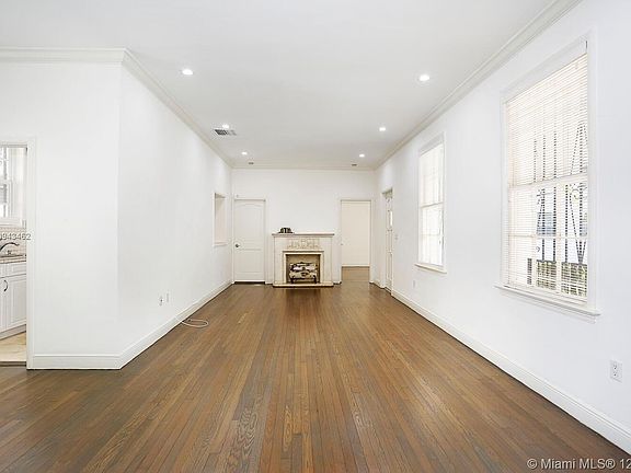 Wonderful wood floors with a beautiful fireplace. The charm of the crown moldings and spaciousness of the high ceilings make it a perfect home.