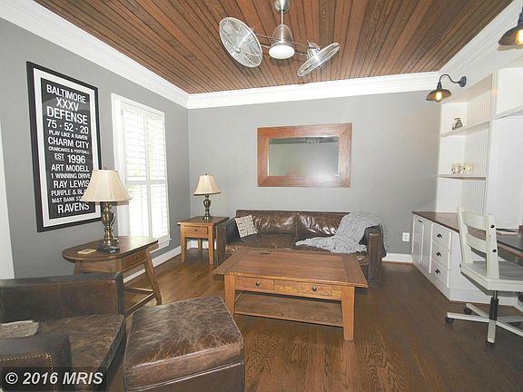 Main level office w/ built in cabinetry