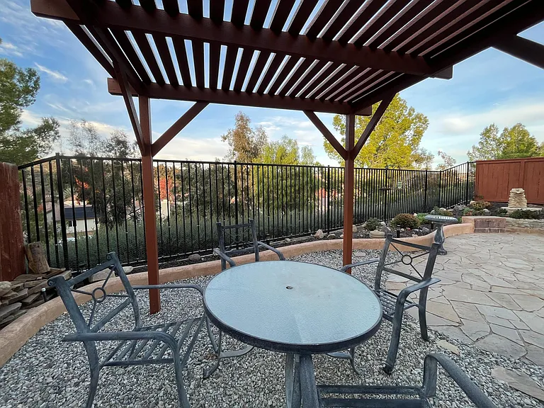 Enjoy your open views and morning cup of coffee under the pergola.