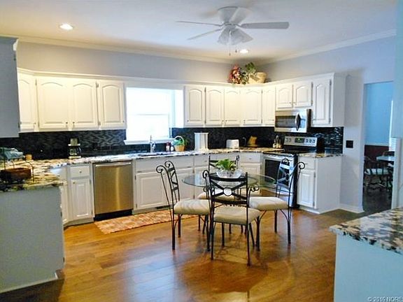 BEAUTIFUL kitchen with new engineered hardwood flooring and high end granite.