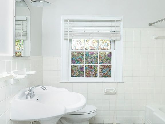 Off the foyer and next to the bedroom is the bathroom. It's classic decor allows you to change the entire look, just by changing the color of your toweIs. It contains a full sized linen closet.