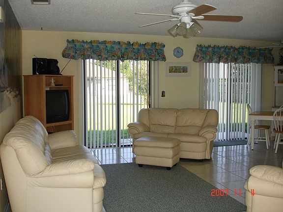 Living Room-tile floors-ceiling fans