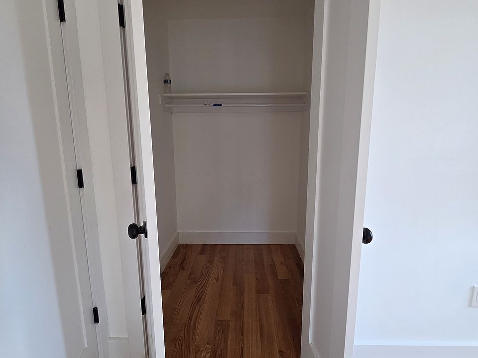 Master Bedroom Closet
The master bedroom includes a full-size closet with double doors and built-in hanging space, providing convenient storage and organization.