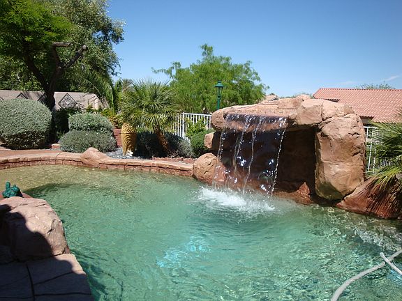 Waterfall with seating under