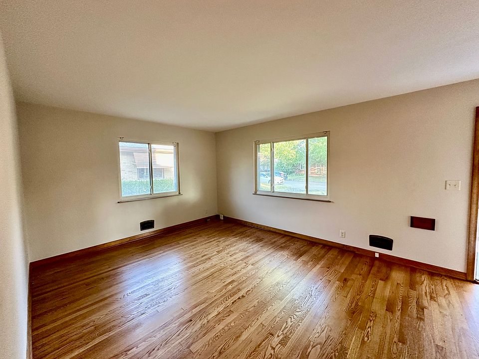 Large family room, freshly painted and refinished hardwood floors