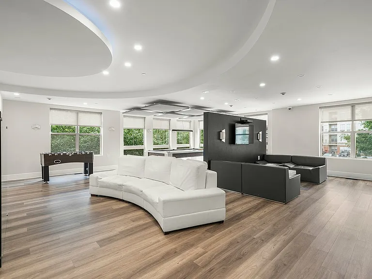 Experience modern comfort in this sleek and spacious lounge area.