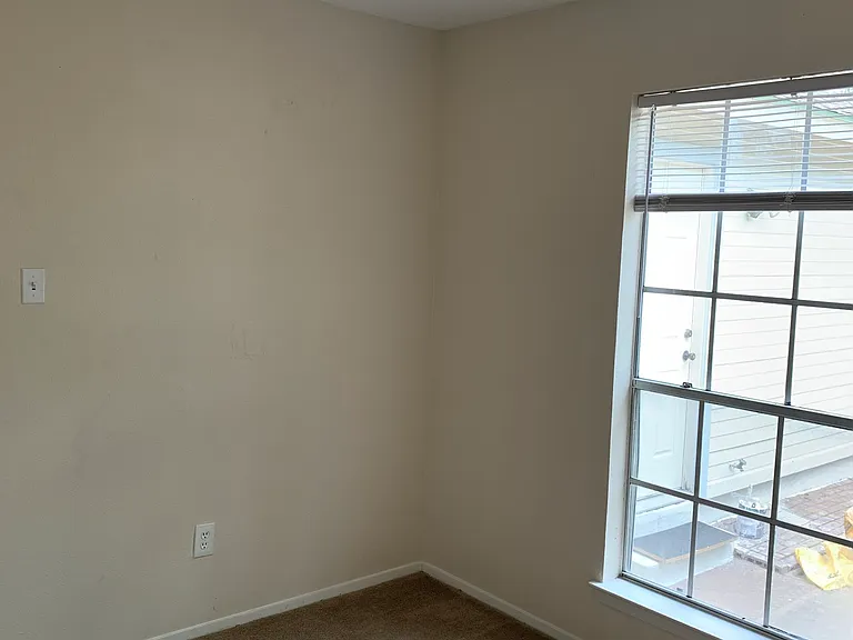 Bedroom with carpet