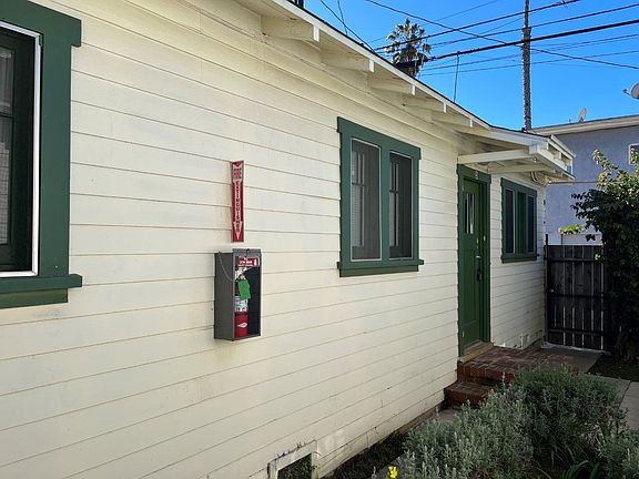 Front door off of rear courtyard