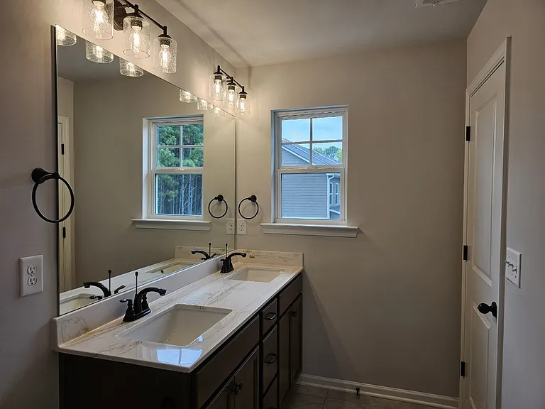Bedroom #2's Bathroom - Two sinks + shower stall