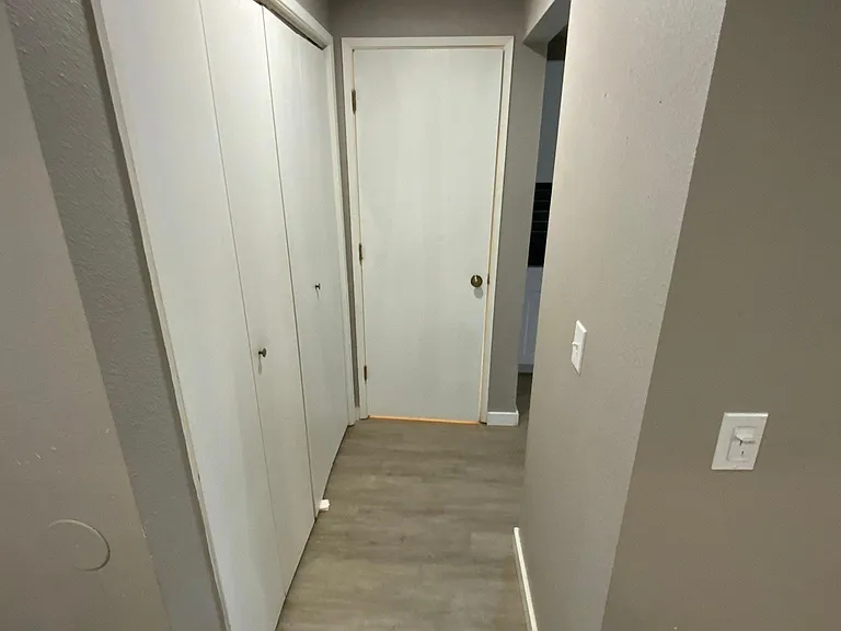hall to kitchen, laundry hook up & 1/2 bath