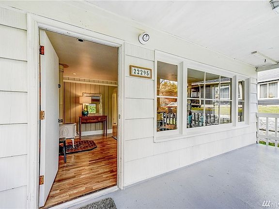 Welcome!  Hint of grand porch and gleaming hardwood floors. 