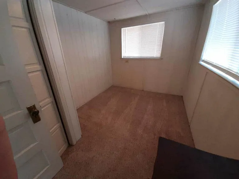Bedroom will fit up to queen size bed.