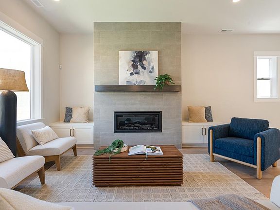 Great room with fireplace and built-in cabinet storage