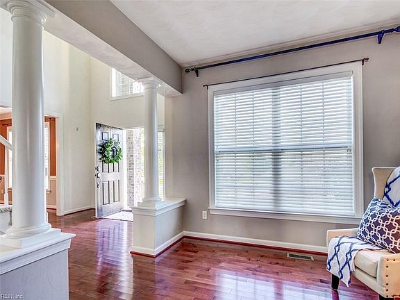 Beautiful hardwood flooring in the entryway, office, dining and kitchen. 