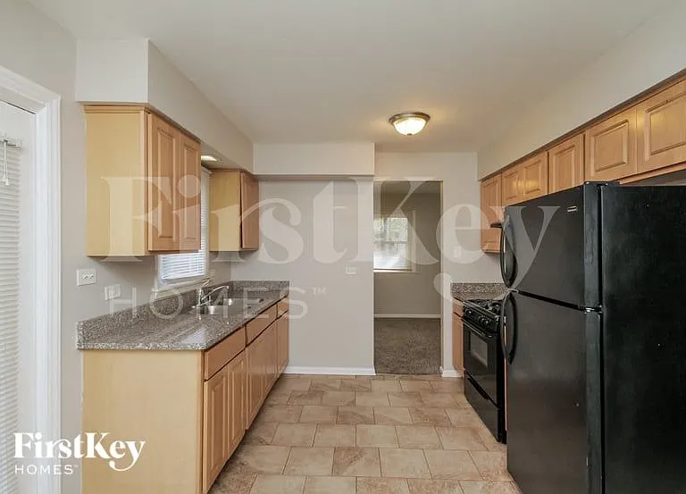 438 E 191st Pl — Photo 6