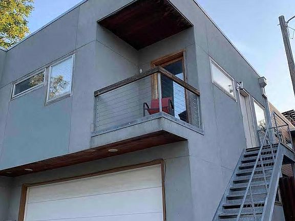 Studio Garage Apartment. Stairs lead to entrance.