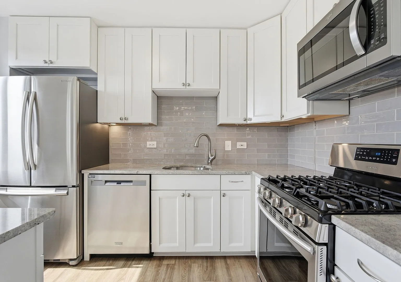 Bright Top-Floor 2BR Condo in The Whitehall with Garage Parking! — Photo 4
