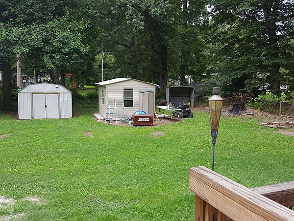 Back yard with sheds