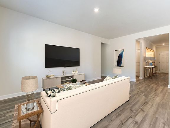 The cozy family room is perfect for quiet movie nights or cheering on the big game.