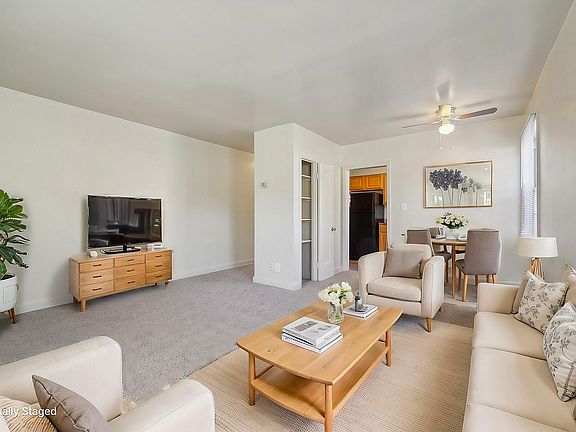 Step into a beautifully staged living room that combines comfort with style.
