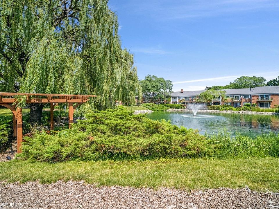 lake and walking paths located in courtyrd