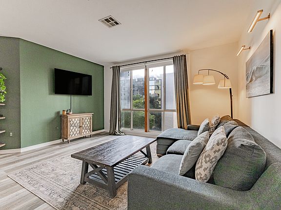 Open concept living room, dining, kitchen