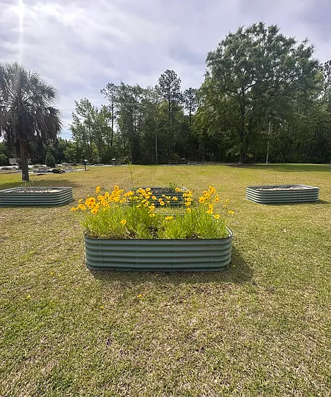 Enjoy the private, community garden and picnic area