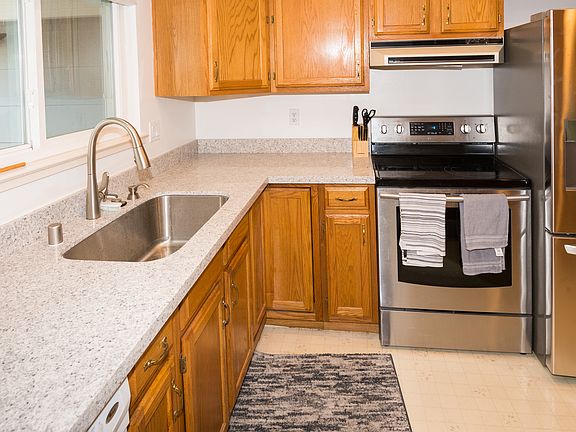 Newer Samsung electric stove & oven, vented range hood, LG French door refrigerator w/ freezer ice maker.